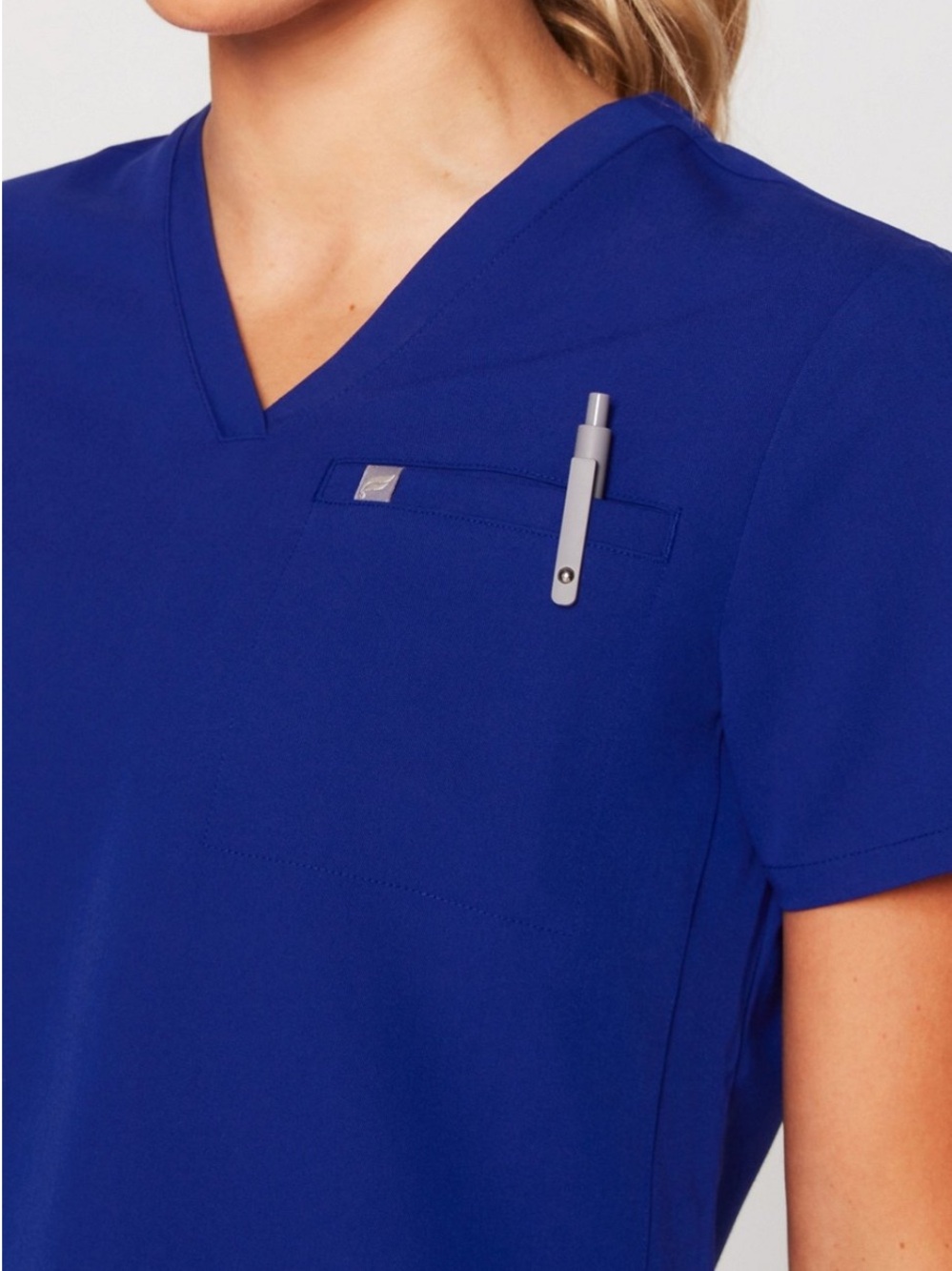 Fabletics Helix one-pocket v-neck scrubs uniform top blue women’s small